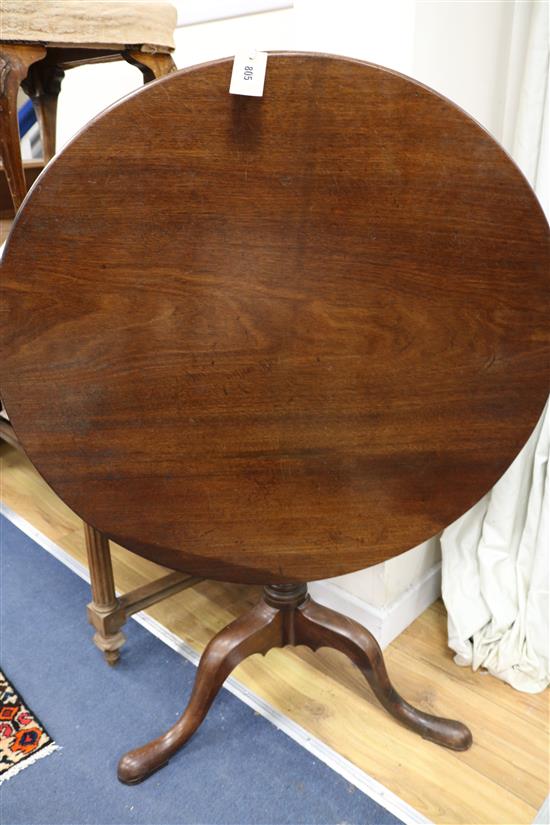 A George III circular tilt-top tripod table, W.80cm
